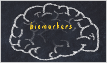 a chalkboard drawing of a brain with text biomarkers
