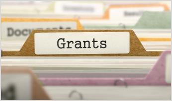 a file folder labelled Grants