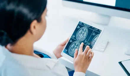 Woman using tablet.