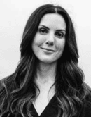 Black-and-white image of a woman with long dark hair.