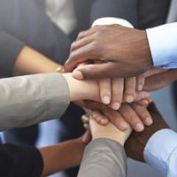 Hands clasped together showing unity