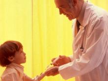 Dr. Brady with young patient