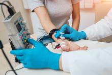 Woman taking a an electromyography, or EMG test, which can diagnose nerve and muscle disorders, spinal nerve root compression, and motor neuron disorders such as amyotrophic lateral sclerosis (ALS).