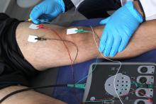 Man having an evoked potentials test which tests sight and hearing (especially in infants and young children) and can help diagnose multiple sclerosis, spinal cord injury, and acoustic neuroma (small tumors of the acoustic nerve).