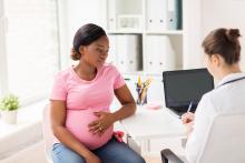 Pregnant woman at a doctor's office.
