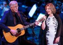 NIH Director Dr. Francis Collins and renowned soprano Renée Fleming perform on stage at the Kennedy Center on June 2, 2017 for the first Sound Health Music and the Mind event.