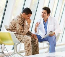image of a doctor speaking to US army soldier