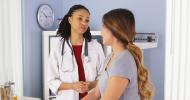 Doctor speaking with female patient