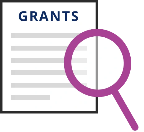 List of grants on paper with magnifying glass